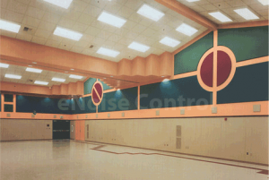 Fabric wrapped acoustical panels in multipurpose room